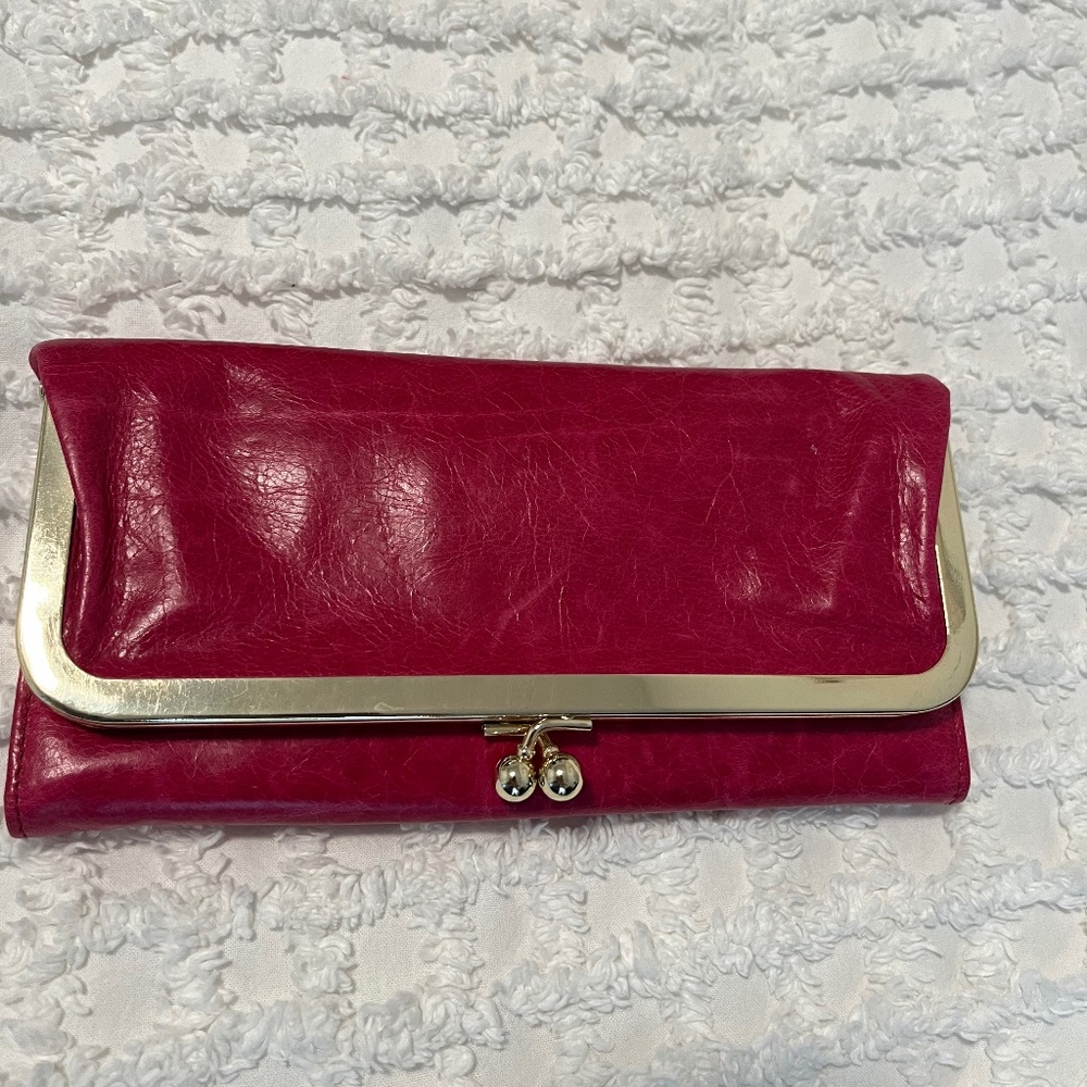 HOBO clutch/wallet in hot pink with gold hardware